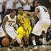 Michigan sophomore Trey Burke attempts to guard Michigan State junior Keith Appling during the first half at Breslin Center in East Lansing on Tuesday, Feb. 12. Melanie Maxwell I AnnArbor.com